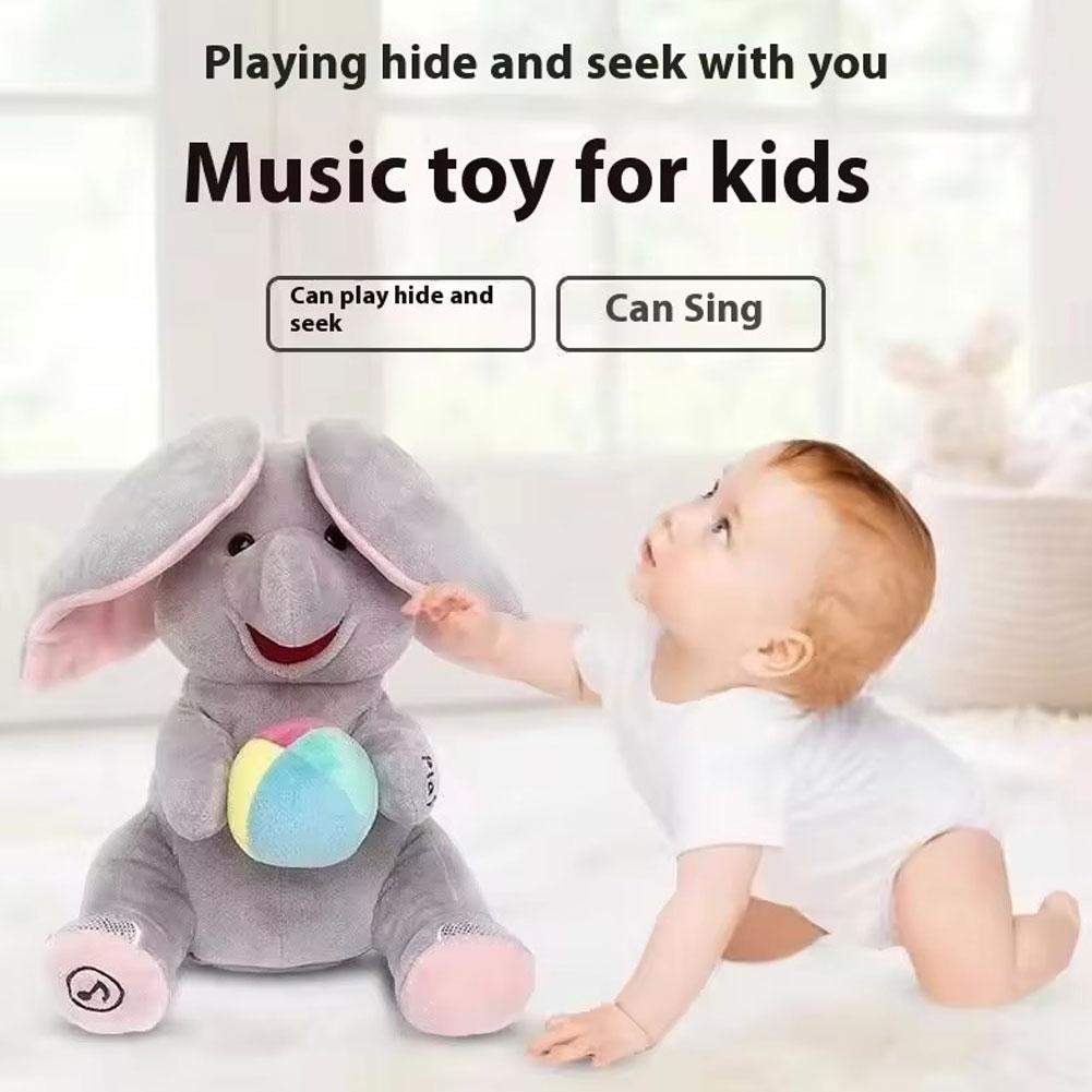 Phone Accessories Baby - ตุ๊กตาช้างซ่อนหา มีหูกระดิก พร้อมดนตรี ร้องเพลง ของเล่นนุ่มนวล ปลอบประโลม